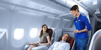 Tips Terbang di Kelas Utama Tanpa Keluar Banyak Uang cara mengatur kursi Pesawat