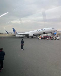 United Airlines Boeing 737-900 (N78448) carrying USC soccer team tipped onto its...