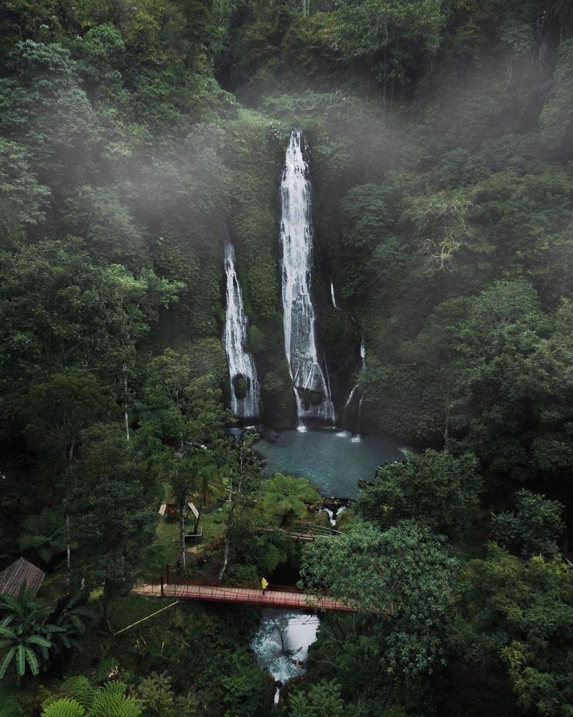 Feel the peaceful atmosphere of #BanyumalaTwinWaterfalls in #Buleleng, #Bali, as...
