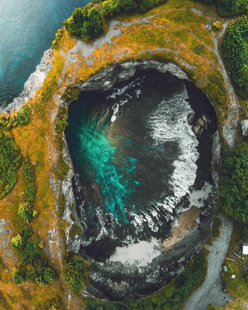 Feast your eyes on the mesmerizing waters of the #BrokenBeach Cliff, captured be...