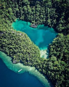 Can you feel the lovely vibes of Lake Tobelo captured in this gorgeous picture b...