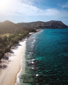 Stroll along North Sulawesi's gorgeous stretch of coastline and leave all your w...