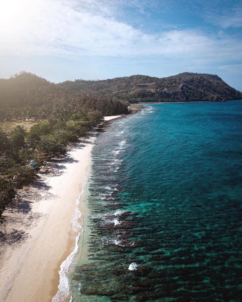 Stroll along North Sulawesi's gorgeous stretch of coastline and leave all your w...