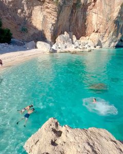 takes us on a mesmerizing journey to the turquoise waters of Baunei in Italy!  T...