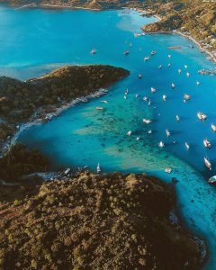 Feast your eyes upon the beauty of Labuan Bajo's marina and let the vibrant colo...