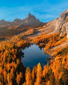 beautifully captures the essence of a perfect autumn morning at Lago Federa.  Se...