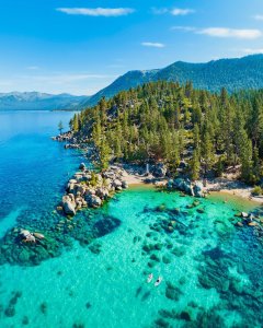 captures the serene beauty of Chimney Beach in Lake Tahoe, Nevada.  It derives i...