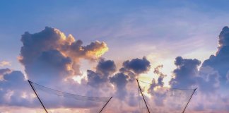 brings us the ethereal reflected scene of locals hunting seafood on Quang Lang B… brings us the ethereal reflected scene of locals hunting seafood on Quang Lang B...