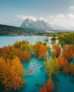 invites you to glide through the tranquil turquoise waters of Alberta, Canada, w...