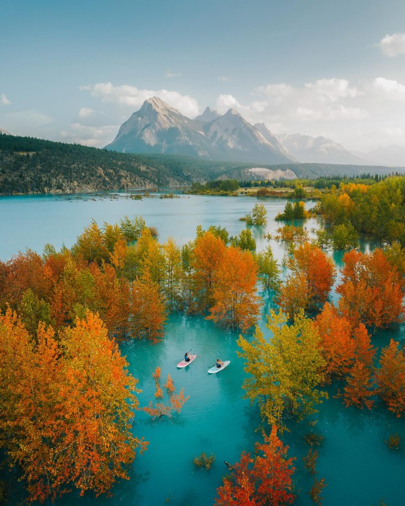 invites you to glide through the tranquil turquoise waters of Alberta, Canada, w...